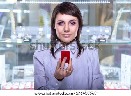Young girl with a box for jewelry. Wedding Ring