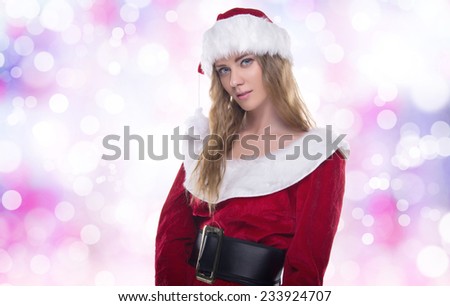 Beautiful young girl in a Christmas costume. New Year\'s holidays. Woman celebrating Christmas