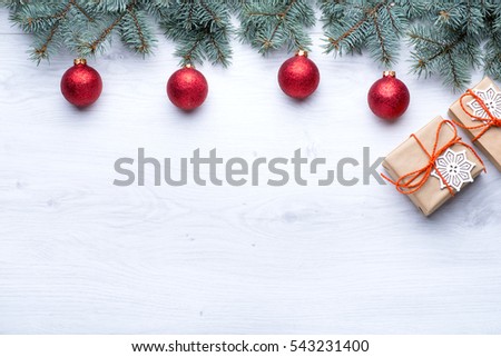 Beautiful celebratory Christmas background. New Year's holidays. Christmas holidays. Beautiful Christmas decorations on the wooden background