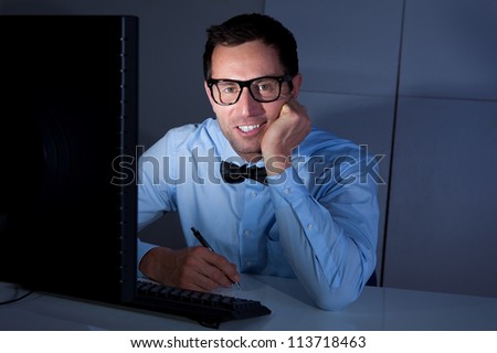 Excited Happy Businessman Looking At Computer In The Office