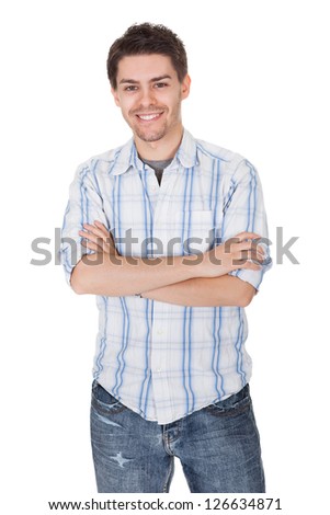 Portrait of smiling young man. Isolated on white