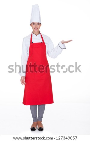 Happy Female Chef Gesturing. Isolated On White