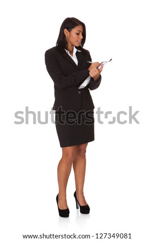 Businesswoman Writing Notes In The File. Isolated on white