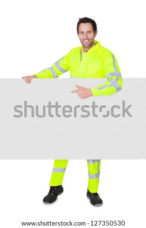 Happy worker wearing safety jacket. Isolated on white