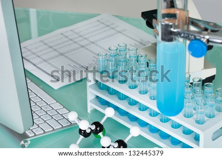 Photos of scientists working place in research laboratory