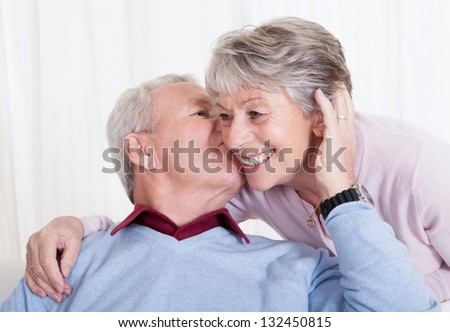 Portrait Of Happy Senior Loving Couple Indoors
