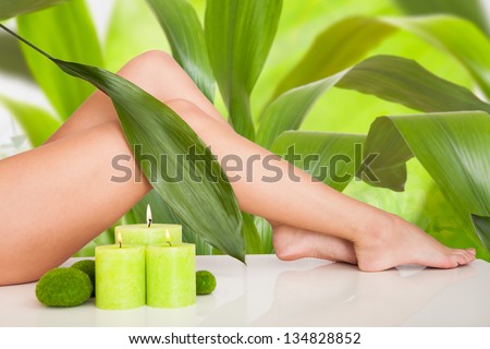 Close Up On Beautiful Woman Legs In Spa