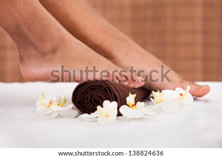 Close-up Of Human Foot Getting Aroma Therapy
