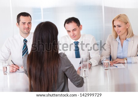 Business Woman Speaking At Interview In Office