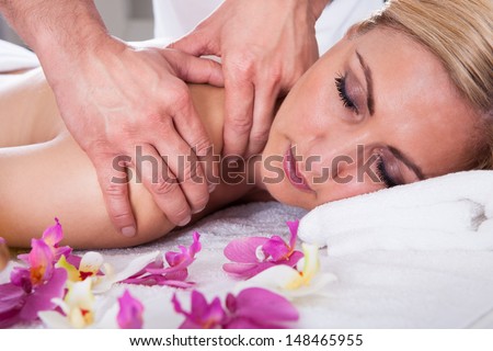 Beautiful Young Woman Getting Message At Spa Salon