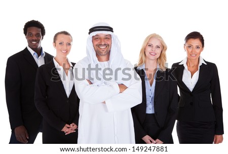 Arabic Man Standing With Businesspeople Over White Background