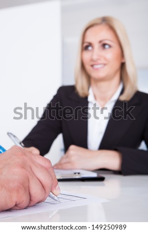 Happy Business Woman Conducting Interview At The Office