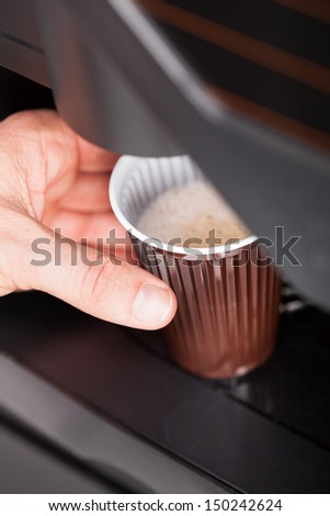 Coffee Maker Pouring Hot Espresso Coffee In A Glass