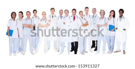 Group Of Smiling Doctors With Stethoscopes Over White Background