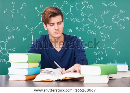 Portrait Of A Young Man Studying Chemistry
