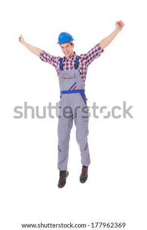 Portrait Of Excited Male Worker Isolated Over White Background