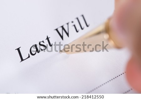 Writing Last Will and Testament. Closeup shot