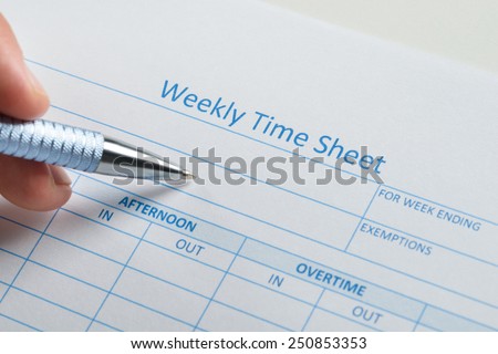Close-up Of Person Hand With Pen Over Blank Weekly Time Sheet