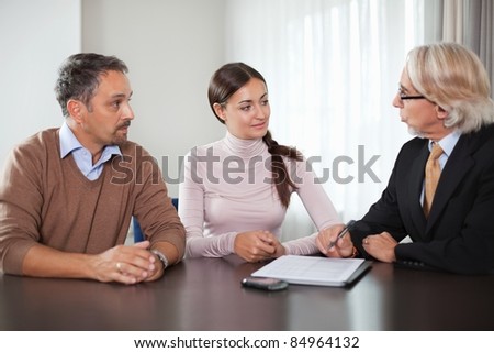 Couple in meeting with a financial planner