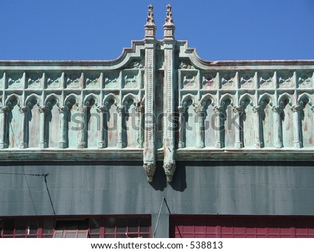 ornate San Francisco victorian building facade with copper patina