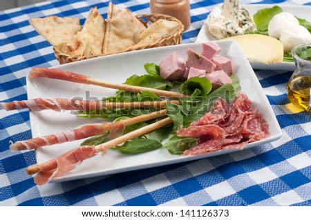 tasty and delicious appetizer of cold cuts