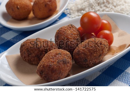 typical appetizer from italy with rice and meat