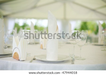 stock photo Elegant tables set up for a wedding banquet