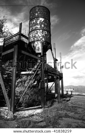 water tank in an abandoned ghost city black and white hdr