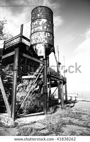 water tank in an abandoned ghost city black and white hdr