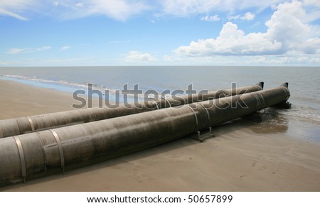 Sewage pipe draining into the ocean