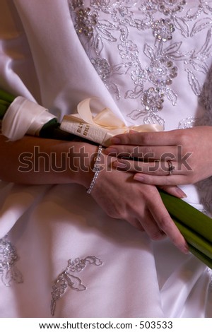 Bride holding Bible and flower