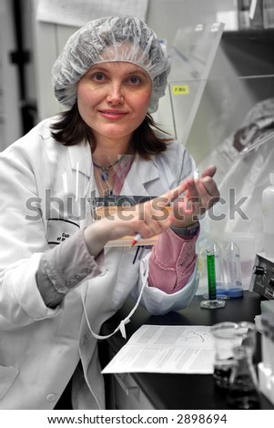 Medical  Doctor of medicine  (PHD) -  female worker in lab of biology  industry