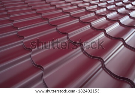 Steel roof painted in red color. Red roof.