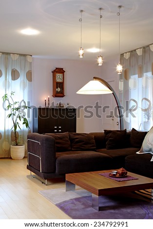 Private house interior. Guest room, desk, floor lamp. Vertical.