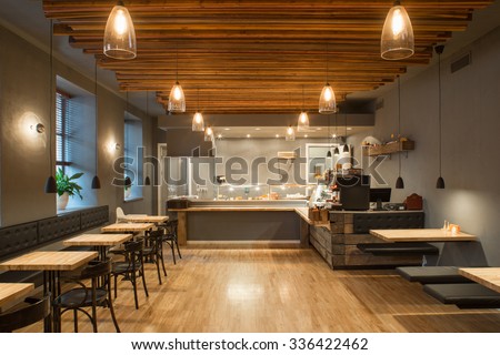 Interior of restaurant. Wooden design.