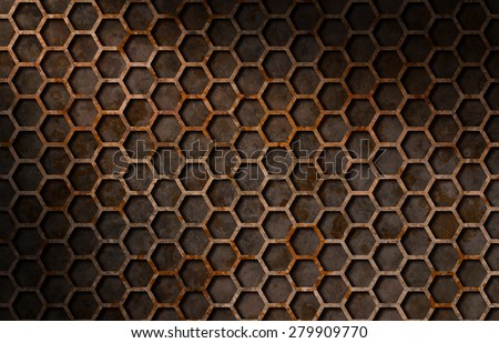 Rusty hexagon pattern grate texture background lit diagonally