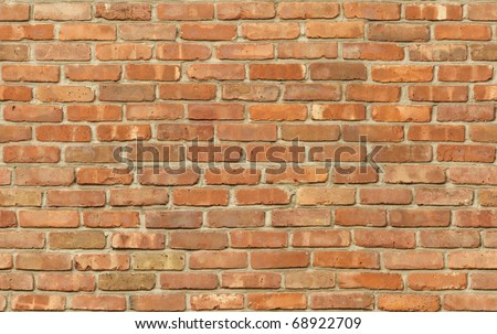 Weathered red brick wall texture seamlessly tileable