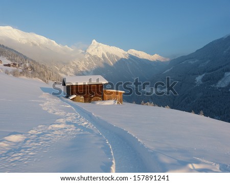 Trail through the snow to the ski lodge