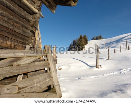 Partial view of a mountain lodge in winter