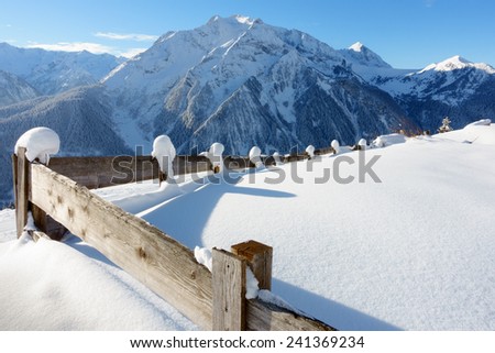 snowed wooden fence