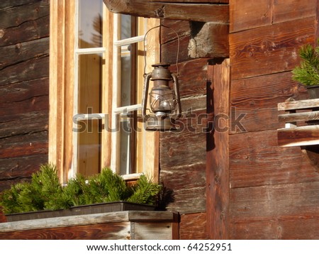 stock photo : Farmhouse with oil lamps as decoration