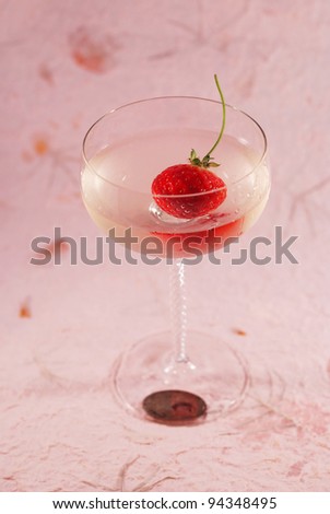 Glass of wine with strawberry