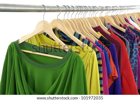 colorful shirt rack on hanger in a row