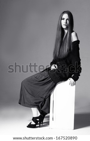 Full body The beautiful woman. A studio photo in full growth. in black and white