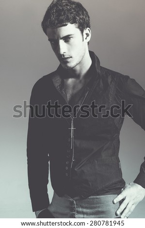 handsome young male model posing - studio shoot