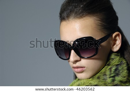 fashion model wearing the big modern sunglasses.