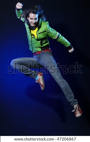 Portrait of a styled professional model. jumping