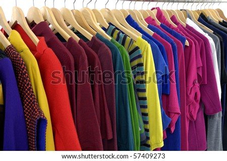 colorful shirt rack on hanger in a row