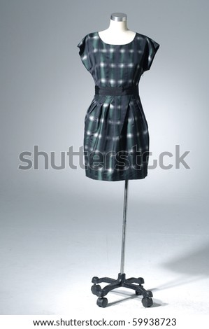 Woman shirt on mannequin on light background