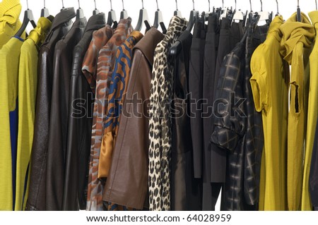Designer fashion clothing hanging as display